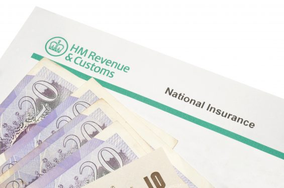 HMRC National Insurance form with a stack of GBP notes on top